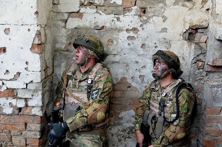 Georgian soldiers from the NATO Response Force keep a lookout