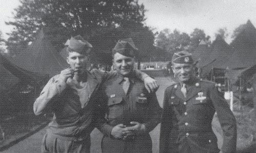 Pvt. John E. Atchley (left), Pvt. Nicholas J. DePalma, and Pvt. Joseph J. Comer (<em>right</em>), paratroopers of H Company, 505th Parachute Infantry Regiment