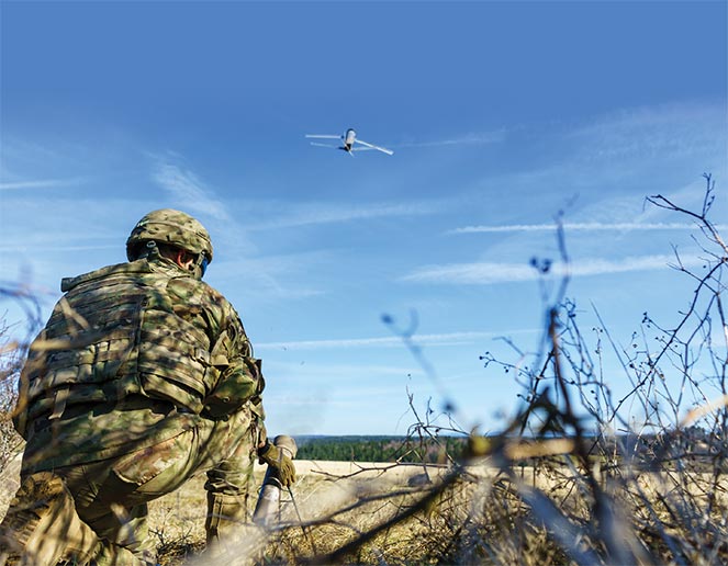 Pvt. 1st Class Brandon Norton, an M1 Abrams crewmember with 1st Battalion, 63rd Armor Regiment, 2nd Armored Brigade Combat Team, 1st Infantry Division, launches a Lethal Miniature Aerial Missile System (LMAMS) for aerial support 6 April 2018 during a Robotic Complex Breach Concept assessment and demonstration at Grafenwoehr, Germany