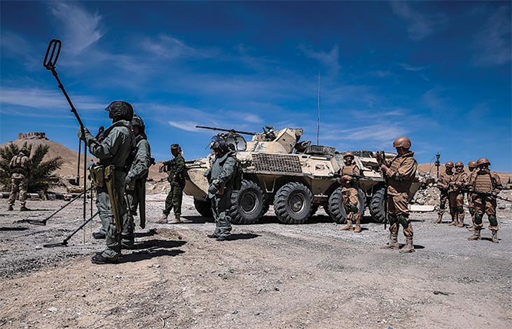 Russian military engineers clear approach routes of mines 2 April 2016 in the ancient city of Palmyra, Syria