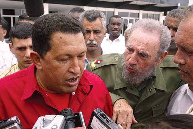 Former Venezuelan President Hugo Chávez (left) and former Cuban President Fidel Castro