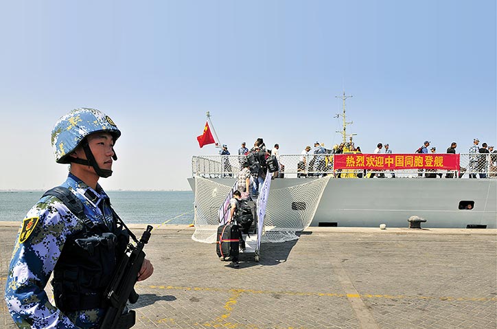 A Chinese soldier of the People’s Liberation Army Navy stands guard