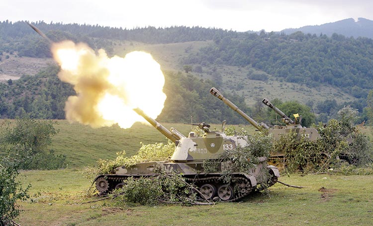 Russian self-propelled howitzer fires a 152 mm shell