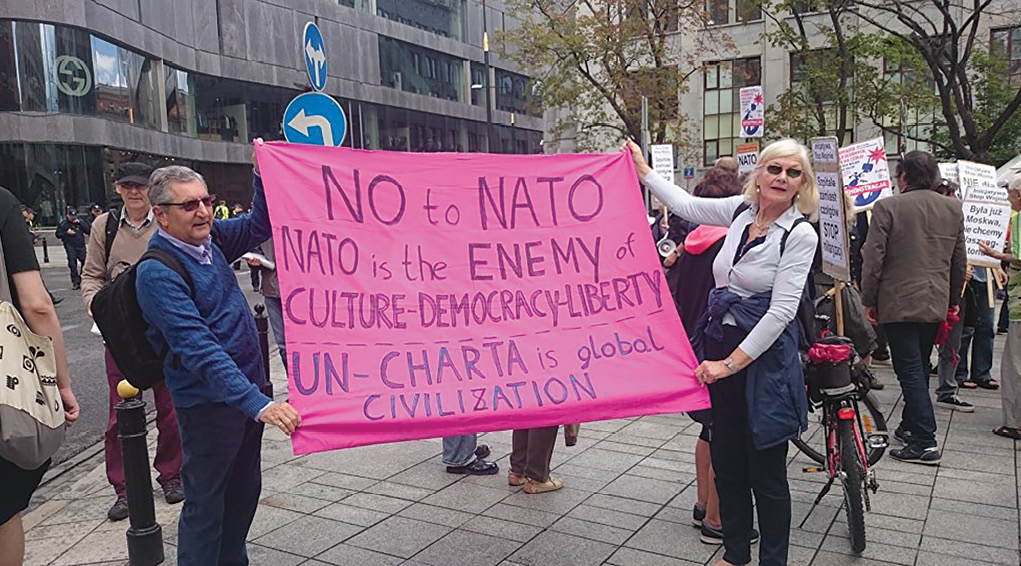 Moldovans protest a NATO summit 9 July 2016 in Warsaw, Poland. Moldovans of ethnic Russian descent together with pro-Russian ethnic Moldovans increasingly act in concert in organized efforts such as demonstrations to put pressure on the Moldovan government to acquiesce to Russian government policy demands. Reportedly cultivated and supported by Russian agents, these efforts specifically promote agitation against Moldova to decrease that country’s association with the European Union and NATO.  (Photo by Denis Bolotsky, Sputnik)