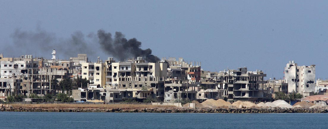 Smoke rises from the Palestinian refugee camp of Nahr al-Bared 3 June 2007 in northern Lebanon.