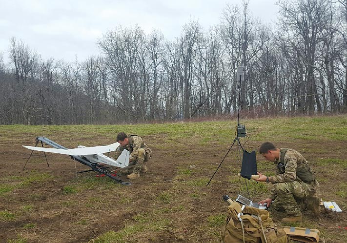 The Ranger Regiment command team prepares to unfurl the Regimental Military Intelligence Battalion colors