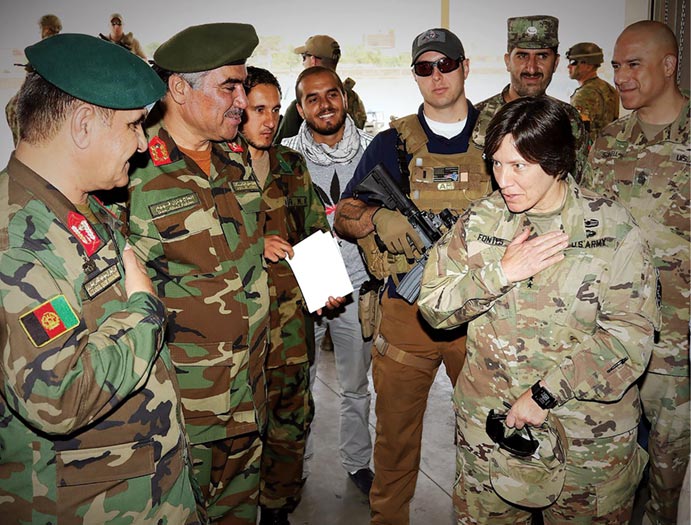 Maj. Gen. Robin Fontes (<em>right</em>), then commander of Combined Security Transition Command-Afghanistan (CSTC-A), meets with Maj. Gen. Monawari (<em>far left</em>), commanding general of Afghan Logistics Command, and Brig. Gen. Fahim (<em>second from left</em>), commander of the Afghan National Army Material Management Center-Afghanistan on 9 August 2017. Fontes is a 1986 graduate of the U.S. Military Academy.