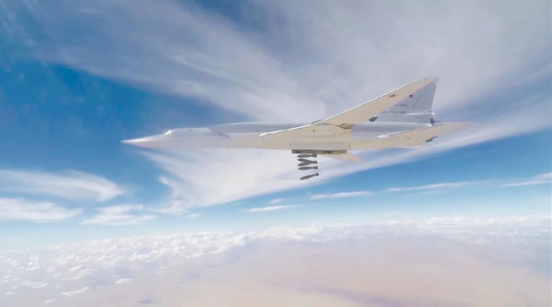 A Tu-22M3 long-range bomber from the Russian Aerospace Forces carries out an air strike on Islamic State targets 1 November 2017 near Abu Kamal, Deir ez-Zor Province, Syria