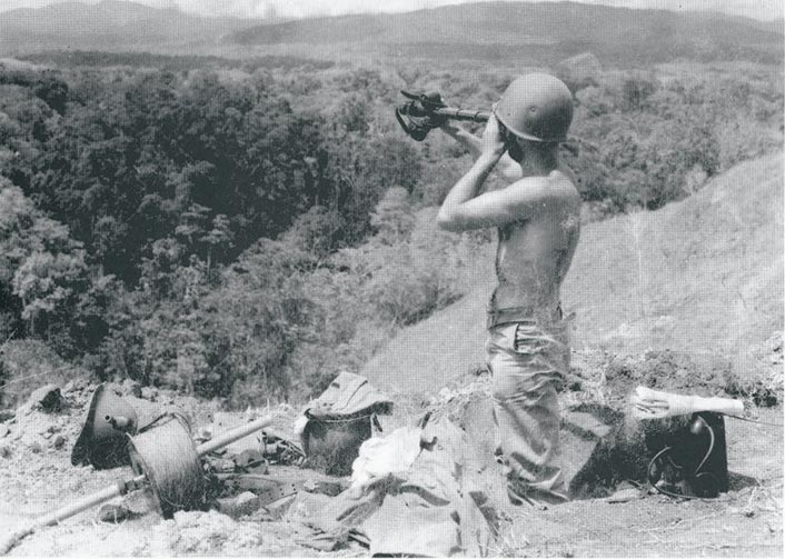 A U.S. Marine guards Hill 80 on Edson’s Ridge (also known as Bloody Ridge), Guadalcanal, in 1942.