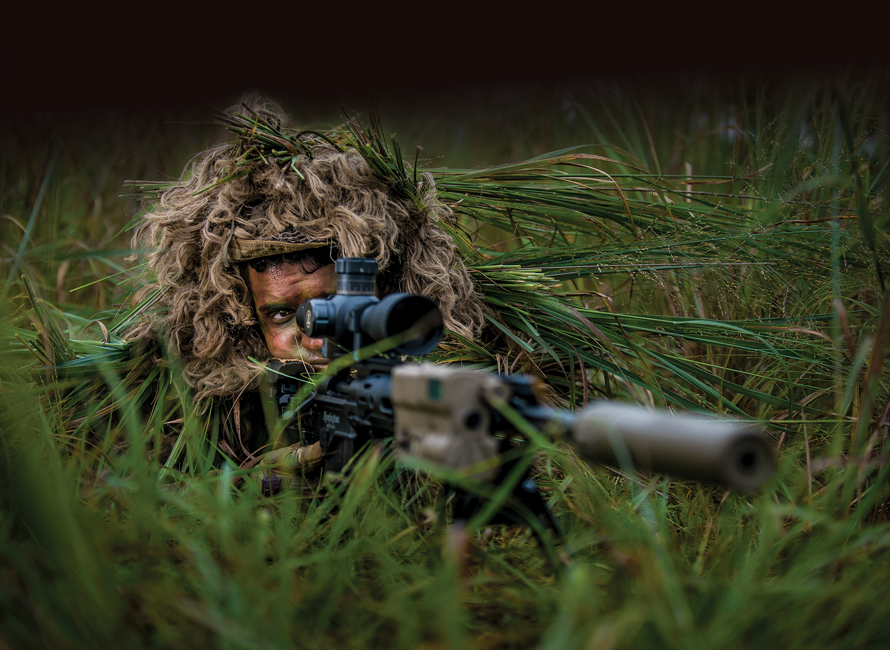 Photo of Sgt. Ian Rivera-Aponte, U.S. Army Reserve sniper and infantryman 26 July 2017 at Joint Base McGuire-Dix-Lakehurst, New Jersey. (Photo by Master Sgt. Michel Sauret, U.S. Army Reserve)