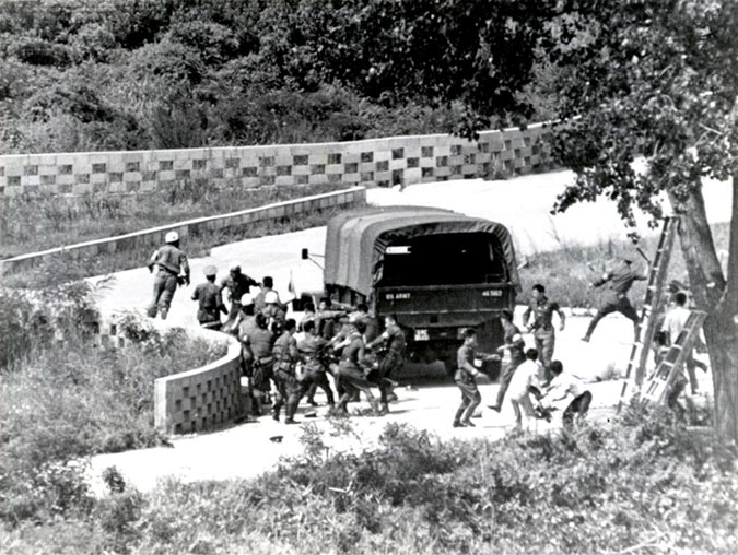 North Korean soldiers attack a tree-pruning crew 18 August 1976 at the Joint Security Area within the demilitarized zone separating North Korea and South Korea in Panmunjom, Korea.