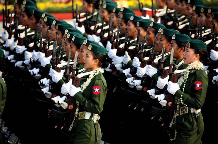Female Myanmar Army soldiers march during the seventy-third Armed Forces Day parade 27 March 2018 in Nay Pyi Taw, Myanmar.