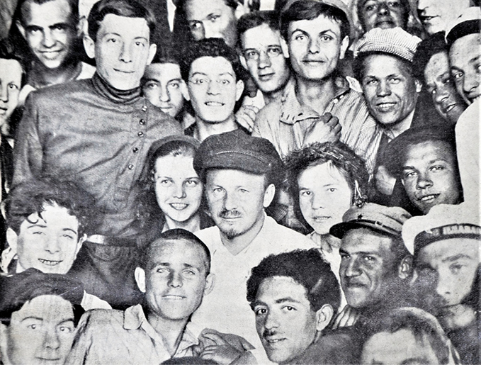 Nikolai Bukharin (center, wearing hat) at a meeting of the workers and peasants news reporters 15 June 1926 in Moscow.