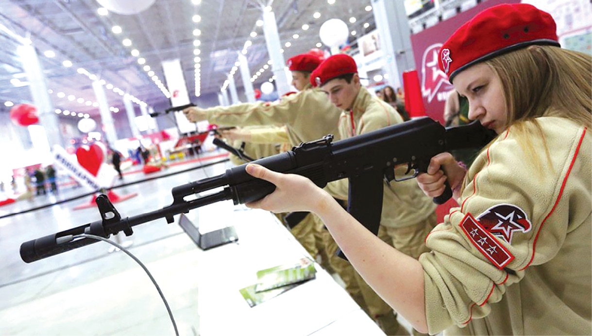 Young Russian members of Yunarmiya attending military-patriotic games where they take part in weapons assembly, marksmanship, and physical endurance competitions. (Photo by Kirill Zykov, Moskva News Agency)