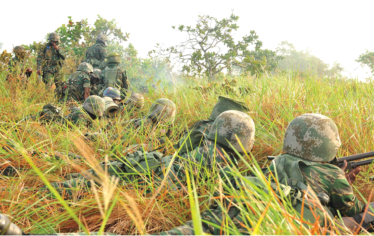 Guyana Defence Force (GDF) soldiers participate in the final attack during Exercise Ironweed in August 2017 at the Colonel John Clarke Military School (CJCMS) at Tacama, Guyana. The exercise is designed to provide an overall assessment of GDF units during simulated combat operations in various types of terrain. (Photo courtesy of the Guyana Defense Force)