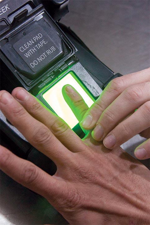 An Iraqi security forces soldier has his fingerprints scanned 10 January 2017