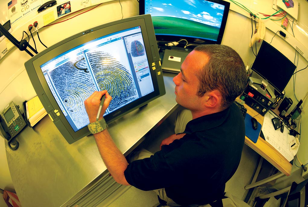 Richard A. Swearengin, a latent fingerprint examiner assigned to the U.S. Army Criminal Investigation Division, Joint Expeditionary Forensic Facility 6