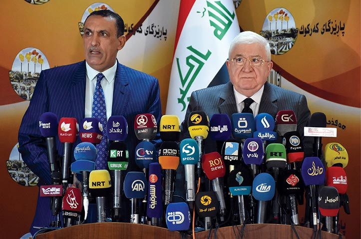 Iraqi President Fuad Masum (<em>right</em>) and Rakan Said al-Juburi, governor of Kirkuk