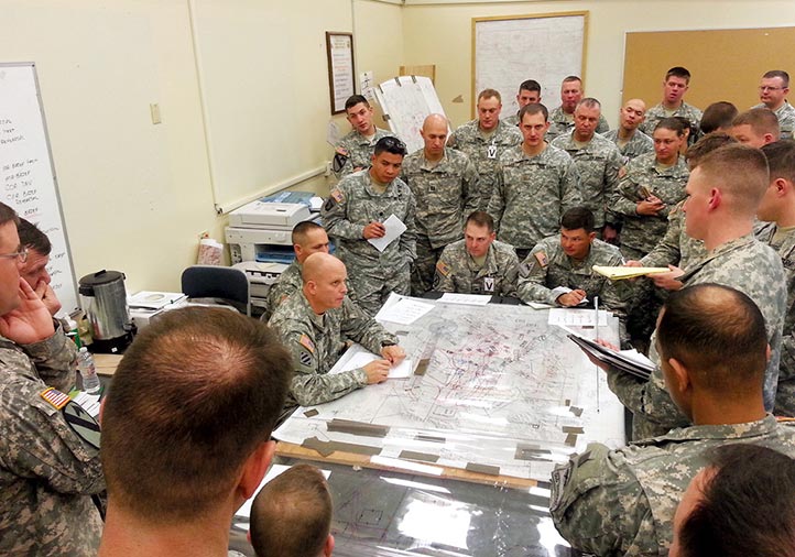 Col. Ross Coffman (seated, left center), 1st Brigade, 1st Armored Division brigade commander