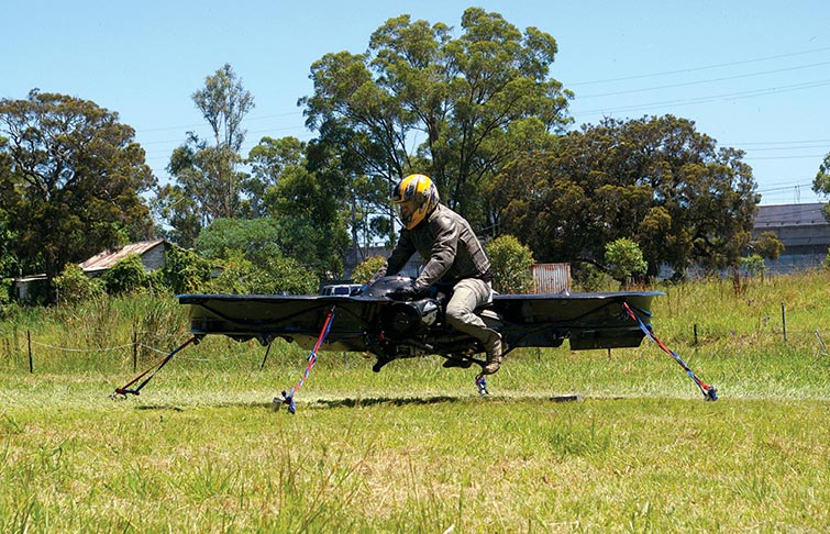 Chris Malloy, founder of Malloy Aeronautics, performs an initial tethered flight test of the original Hoverbike concept in December 2010 in Sydney.