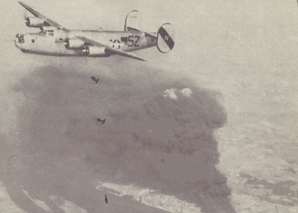 Plane dropping bombs.