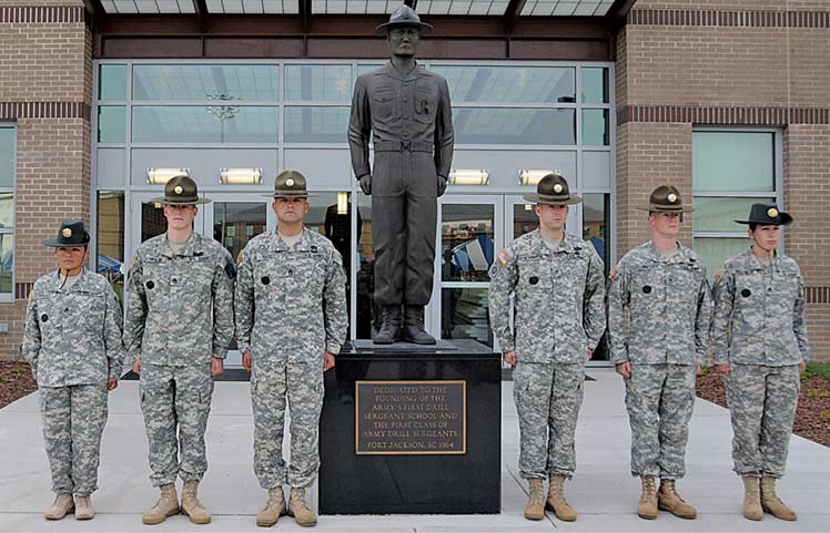 The competitors of the 2011 Drill Sergeant of the Year Competition stand in front of the U.S. Army Drill Sergeant School at Fort Jackson, S.C.