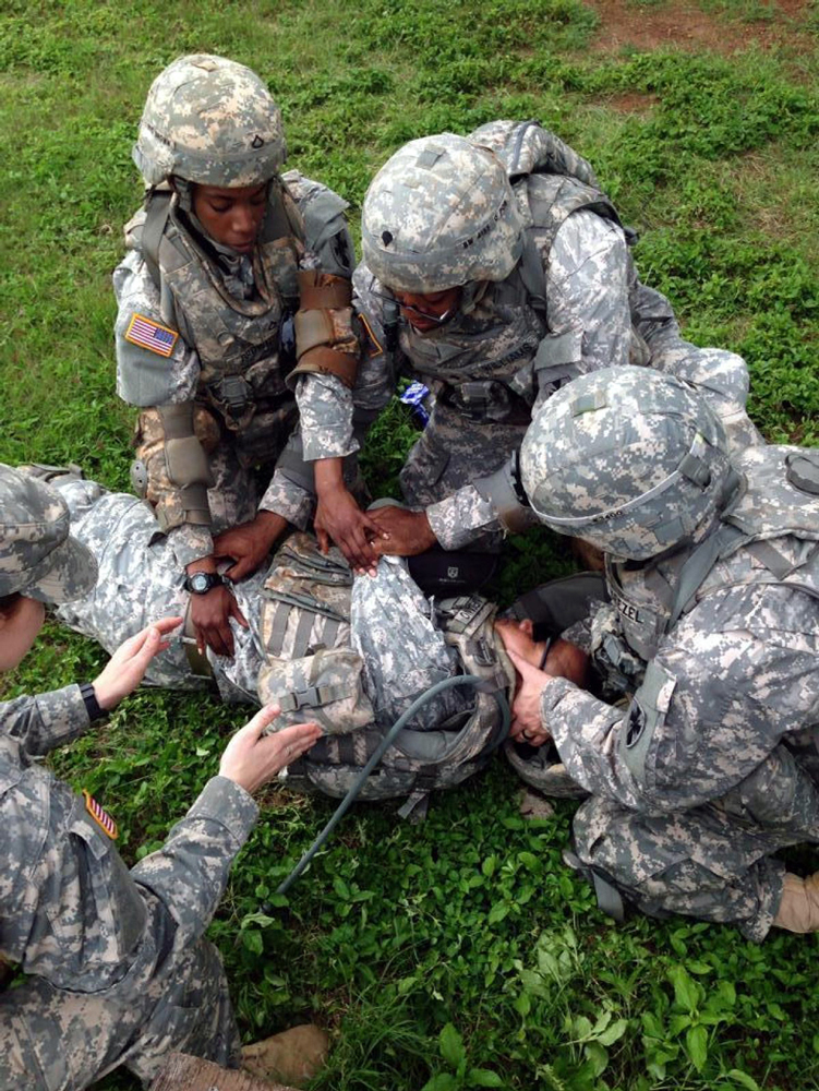 Several Soldiers with Headquarters and Headquarters Company, 8th Special Troops Battalion, practice their combat lifesaving techniques during a sergeants time training at Schofield Barracks, Hawaii. (U.S. Army photo courtesy of Headquarters and Headquarters Company, 8th Special Troops Battalion)