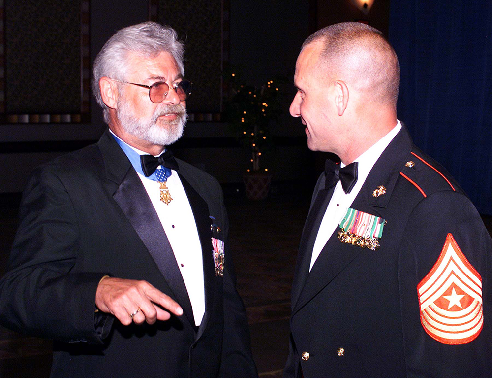 Vietnam War Medal of Honor recipient retired Army Sgt. Maj. Jon Cavaiani, left, chats with Marine Corps Sgt. Maj. Mark Allen of the 6th Motor Transport Battalion based in Red Bank, N.J., during the Marine Corps Law Enforcement Foundation's 10th Annual Invitational Gala in Atlantic City, N.J., June 12. (Photo by Rudi Williams )
