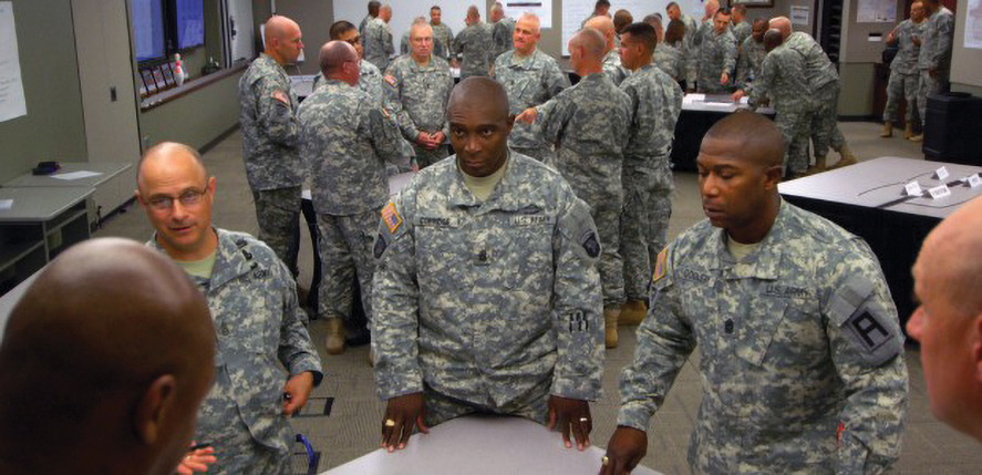 Command Sergeants Major work on problems during a course at Fort Leavenworth, Kansas. (Credit: US Army Jonathan Jay Koester)