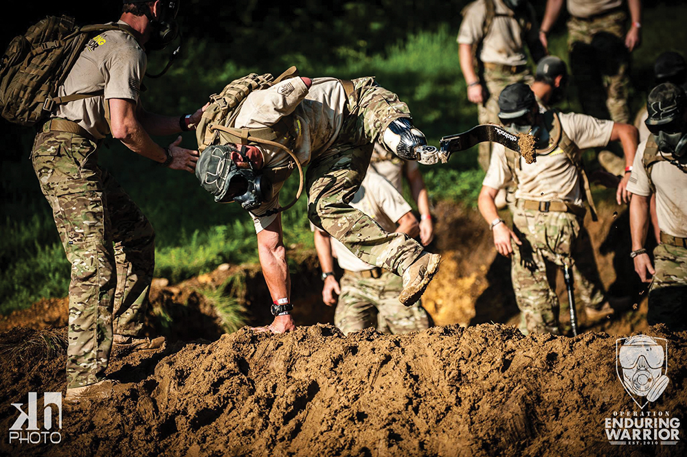 Noah Galloway participates in an adventure race with other members of Operation Enduring Warrior. The nonprofit group pays for injured veterans to travel to and participate in the races. (Photo courtesy of Operation Enduring Warrior)
