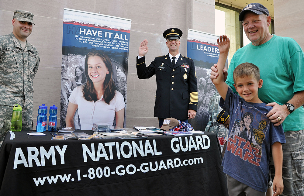 Recruiters from the Virginia National Guard meet with the public in June 2011 outside the Virginia War Memorial in Richmond, Virginia, during a 236th Army Birthday celebration. (Photo by Staff Sgt. Andrew H. Owen)