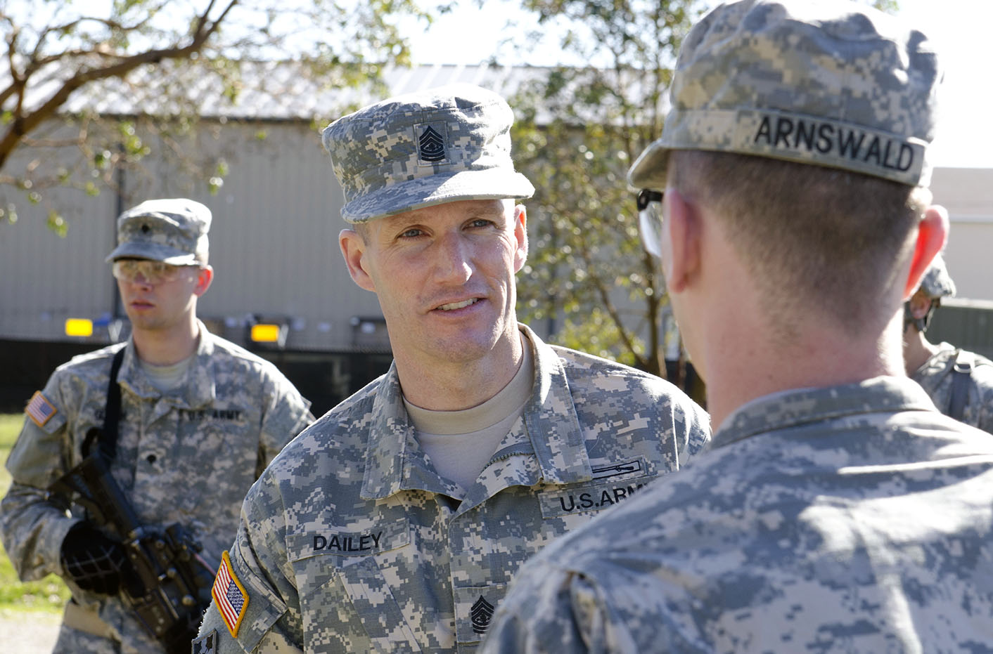 Sgt. Maj. of the Army Daniel Dailey visits with 2nd Battalion, 1st Infantry Regiment Soldiers during a training exercise at JBLM on March 3. During his two-day visit, Dailey stressed the importance of leaders being present for training and beginning each morning with challenging physical fitness training.