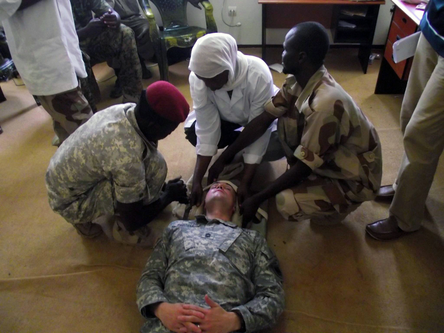 1st Sgt. Richard Russell, former operations NCO with the U.S. Army Africa Surgeon’s Office, leads a course on Tactical Combat Casualty Care for soldiers in N’Djamena, Chad, in the spring of 2014. (U.S. Army photo)