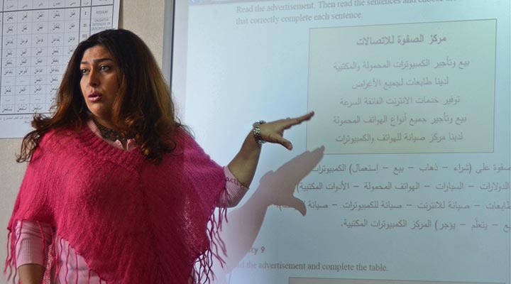 >A professor leads a Modern Standard Arabic (MSA) class at the Defense Language Institute Foreign Language Center.
