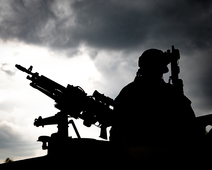 A Green Beret assigned to 3rd Special Forces Group (Airborne) pulls security during a raid as part of a routine training mission April 8, 2019 at Camp Mackal, NC