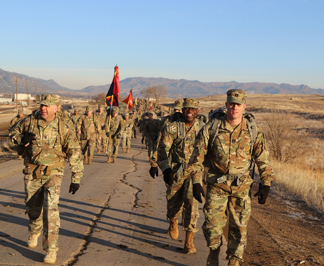 Command Sgt. Maj. Jerel B. Foster talks with Soldiers