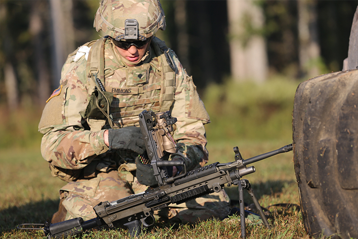 Spc. Caden Emmons clears a stoppage in his weapon during the 2018 Best Warrior Competition.