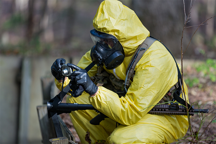 Army Staff Sgt. Cesar Gonzalez takes protective measures during the 2018 Best Warrior Competition at Fort A.P. Hill, Va., Oct. 2, 2018.