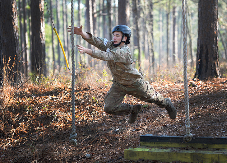 A Special Forces candidate at the U.S. Army John F. Kennedy Special Warfare Center and School jumps onto a rope on Nasty Nick, the school’s obstacle course, during Special Forces Assessment and Selection (SFAS) at Camp Mackall, North Carolina, Jan. 16, 2019