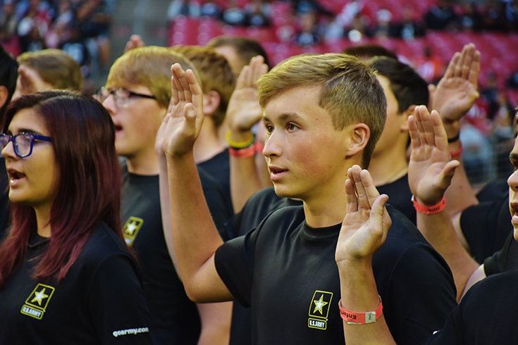 Future Soldiers from the Phoenix Recruiting Battalion, recite the oath of enlistment