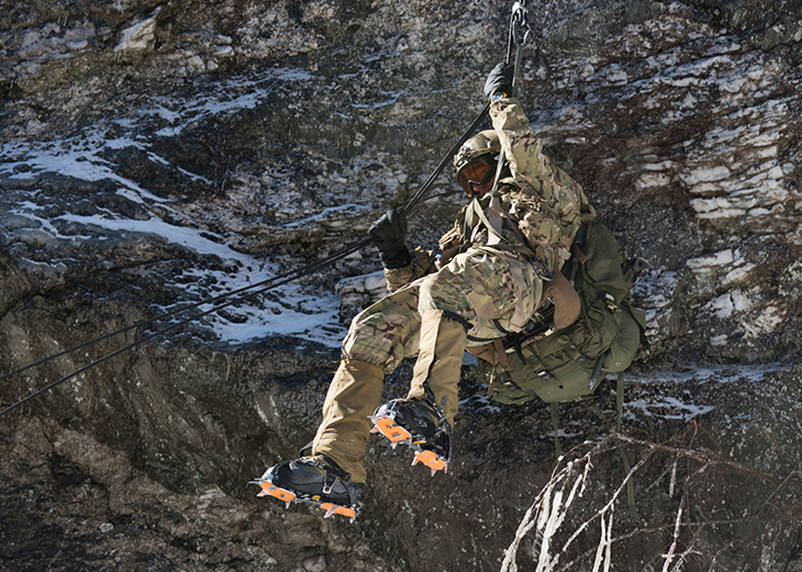 A U.S. Army Soldier rappels a cliff face