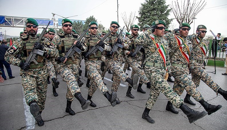 Iranian soldiers march during a military parade in 2018.