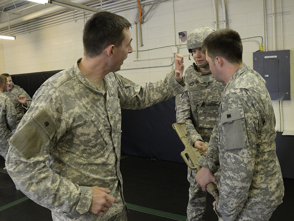 Spc. Kenneth Schunke, left, instructs incoming Soldiers of the 4th Combat Aviation Brigade during a combatives course as part of training conducted by the Aviation Mission Readiness Integration Company at Fort Carson, Colo. (Photo by Pablo Villa)