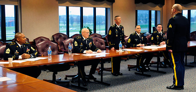 Sgt. Quintin Steeves addresses the 316th Sustainment Command (Expeditionary) promotion board in December 2014 at the Vernon T. McGarity Army Reserve Center in Coraopolis, Pa. (Photo by Master Sgt. D. Keith Johnson)