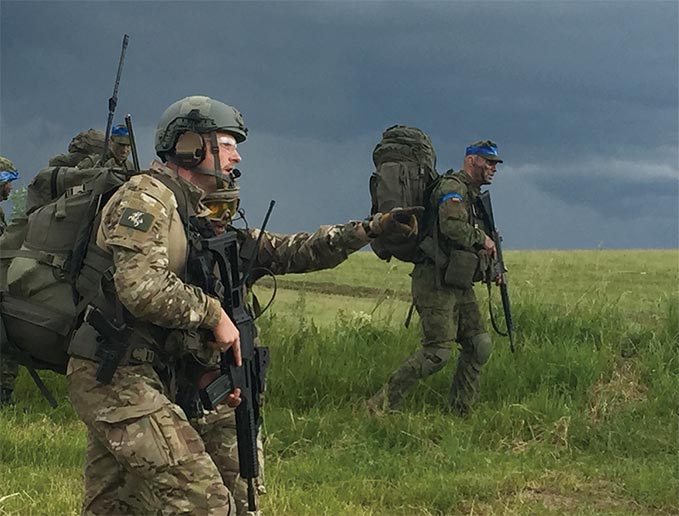 A marine from X-Ray Company, 45 Commando British Royal Marines leads a patrol 17 June 2017 