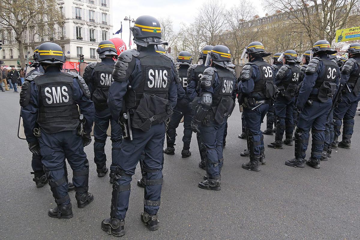 French CRS police officers conduct crowd control during a 2016 demonstration in Paris.