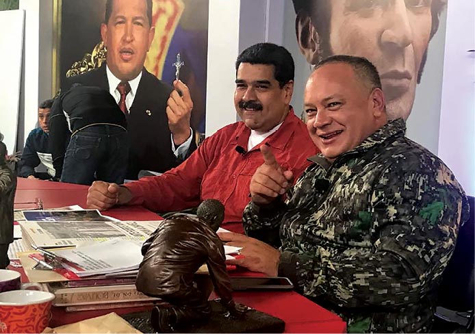 Venezuela’s disputed President Nicolás Maduro (<em>left</em>) joins the president of the Venezuelan National Constituent Assembly