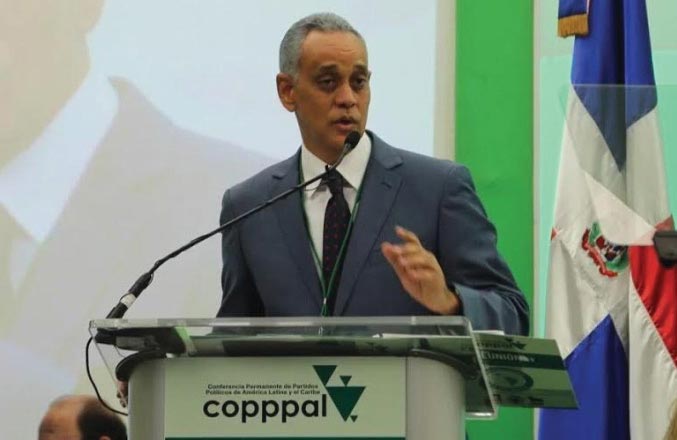 Manolo Pichardo speaks at a Permanent Conference of Political Parties of Latin America and the Caribbean