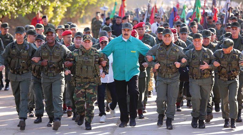 Supporters listen as Revolutionary Armed Forces of Colombia–People’s Army