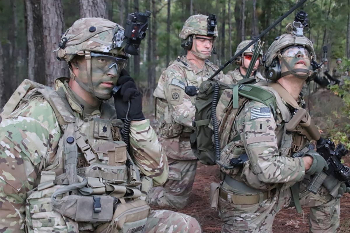 A battalion commander receives a situation report from his company commanders prior to proceeding to a battalion objective 24 October 2019 at the Joint Readiness Training Center, Fort Polk, Louisiana.